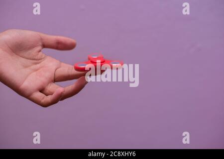 Tourne-disque figet tournant à la main Banque D'Images