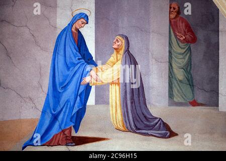 Église Saint-Jean-Baptiste. Murale. La visite à Marie. Megève. France. Banque D'Images