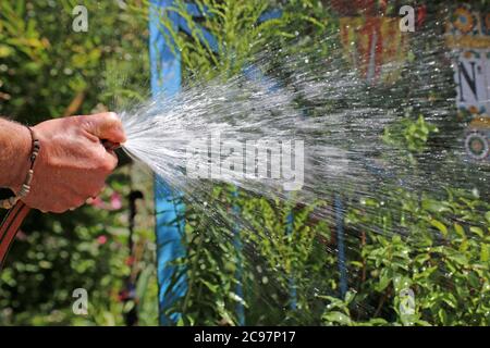 Les eaux de l'homme son jardin Banque D'Images