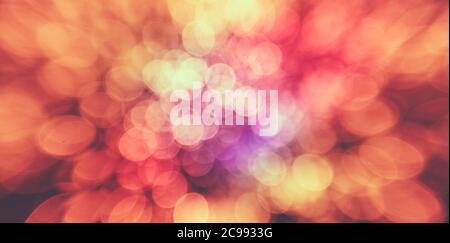 Arrière-plan abstrait coloré aux couleurs chaudes. Les lumières de bokeh sont hors foyer. Banque D'Images