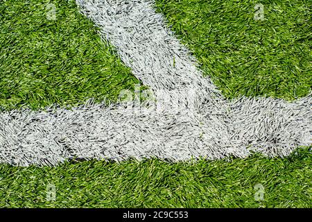 Inscriptions blanches sur un terrain de football. Banque D'Images