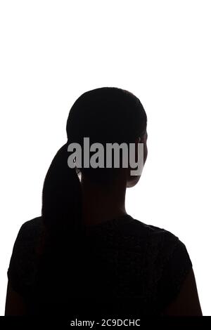 Silhouette d'une jeune fille à partir du dos avec une mèche de cheveux - isolée, non-apyée Banque D'Images