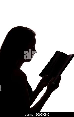 Fille a lu un livre - silhouette, isoler Banque D'Images