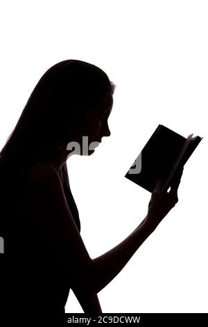 Fille a lu un livre - silhouette, isoler Banque D'Images