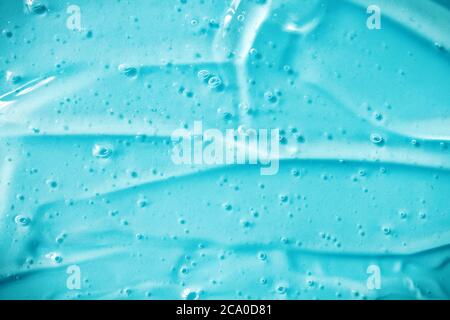 Gros plan de gel bleu avec bulles. Banque D'Images