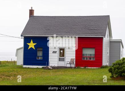 Couleurs peintes du drapeau acadien, Grande Anse, Nouveau-Brunswick NB, Canada Banque D'Images