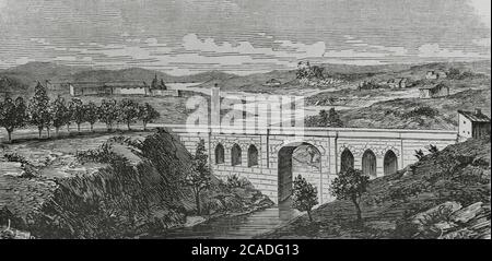 Espagne, province d'Alicante, Alcoy. Vue panoramique du pont Maria Cristina, sur le lit de la rivière Riquer. Il a été construit dans le style médiéval entre 1828 et 1838. Il a été nommé Maria Cristina en hommage à Maria Cristina Borbon dos Sicilias, la quatrième femme du roi Fernando VII Gravure de Capuz, 19e siècle. Illustration par LERE. Cronica général de España. Historia Ilustrada y Descriptiva de sus Provincias. Valence, 1867. Banque D'Images