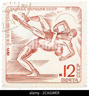 Le timbre imprimé en URSS (Russie) montre Wrestling avec l'inscription et le nom d'une série '1971, 5 Jeux d'été du peuple de l'URSS' Banque D'Images