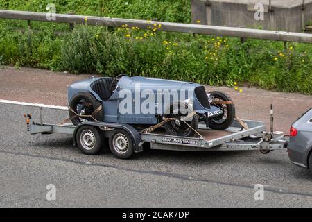 1931 projet de restauration Morris British d'avant-guerre, grange rare convertible sur remorque, capote souple, roadster à toit ouvert, cabriolets, capotes, Voitures de sport, roadster classique sur remorque ; circulation automobile au Royaume-Uni. Banque D'Images