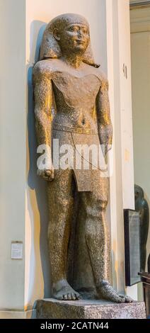Égypte, le Caire, Musée égyptien, statue colossale d'Amenhotep, fils d'Hapu, sculptée à la fin de la période. Banque D'Images