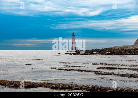 Phare d'Eastbourne à marée basse Banque D'Images