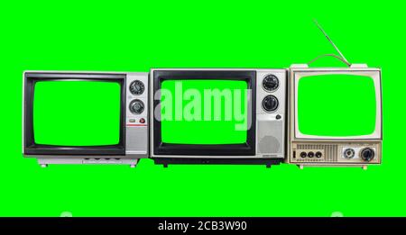 Trois téléviseurs d'époque avec écran couleur vert et arrière-plan. Banque D'Images