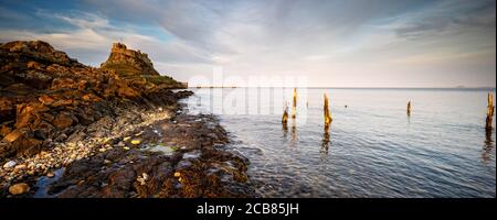 Earl Evening au château de Lindisfarne Banque D'Images