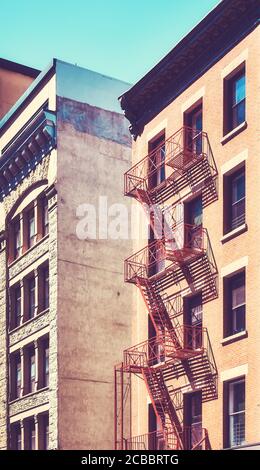 Image stylisée rétro des anciens bâtiments résidentiels, New York City, États-Unis. Banque D'Images