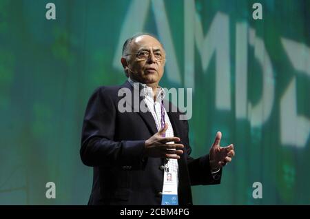 Austin, Texas: May, 2006: Hector Ruiz, PDG d'Advanced micro Devices, s'adresse aux délégués du Congrès mondial des technologies de l'information (WCIT) de 2006, un rassemblement de leaders mondiaux de haute technologie. Ruiz, originaire du Mexique, a progressé dans les rangs dans ses 24 années chez AMD. ©Bob Daemmrich / Banque D'Images