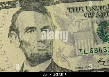 Abraham Lincoln portrait sur cinq dollars billet macro Banque D'Images