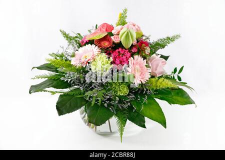 Un joli bouquet de fleurs dans un verre vase Banque D'Images