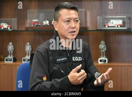 Hong Kong. 15 août 2020. Suryanto Chin-chiu, agent d'élimination des bombes du bureau d'élimination des munitions explosives (DOE) de la police, reçoit un entretien avec Xinhua à Hong Kong, dans le sud de la Chine, le 7 août 2020. POUR ALLER AVEC 'Spotlight: Rencontrez les héros qui désamorquent les bombes de la Seconde Guerre mondiale à Hong Kong' Credit: Xinhua/Alay Live News Banque D'Images