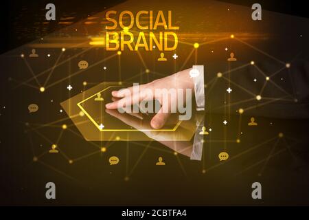 Navigation dans les réseaux sociaux avec inscription de la marque sociale, nouveau media concept Banque D'Images