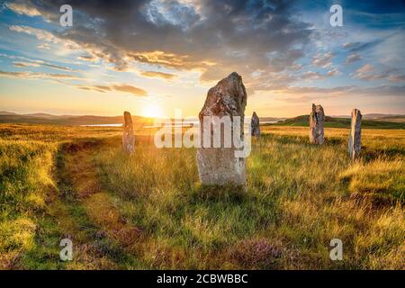 Coucher de soleil sur le cercle de pierre de Ceann Hulavig sur l'île de Lewis dans les Hébrides d'Écosse, également connu sous le nom de Callanish 4 Banque D'Images