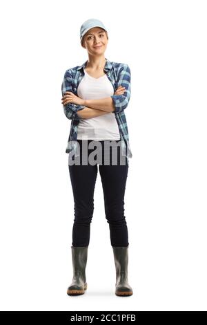 Portrait en longueur d'une femme jardinière posant avec croisé bras isolés sur fond blanc Banque D'Images