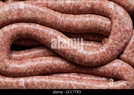Longueur de saucisse Cumberland traditionnelle fraîchement préparée. Pas habituellement lié, mais servi enroulé ou en longueur. Banque D'Images