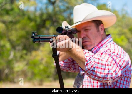 Texas, Cowboy tir chasse fusil, gros plan Banque D'Images