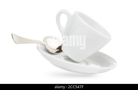 tasse à café en porcelaine sur soucoupe avec cuillère isolée sur blanc Banque D'Images