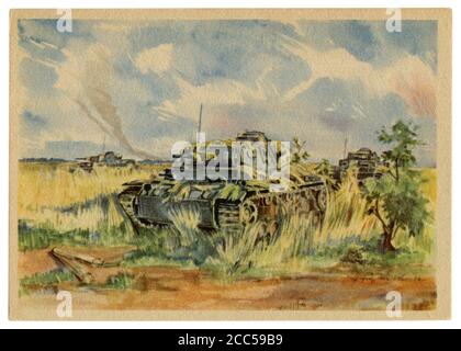 Carte postale historique allemande : camouflée par l'herbe, les chars moyens nazis pz III dans une embuscade sur le terrain. Front de l'est, deuxième guerre mondiale, troisième Reich, 1942 Banque D'Images