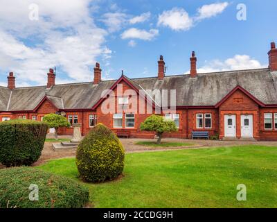 De vieilles almshres au village de Nidd près de Harrogate Nord Yorkshire Angleterre Banque D'Images