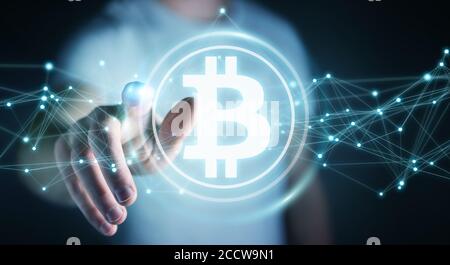 Homme d'affaires sur un arrière-plan flou en utilisant le rendu 3D de crypto-monnaie bitcoins Banque D'Images