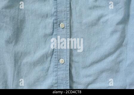 Boutons sur une chemise bleue. Détails. Gros plan Banque D'Images