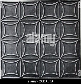. Plafonds et parois latérales : N° de catalogue 60 . i plaque N° 565 Dimensions, 24 X 24 pouces. Design, 3 pouces, plusieurs mots de code—Melhund. Plaque n° 566 Sizer24 X 24 pouces. Design, 6 pouces, plusieurs mots de code—Melody. Plafonds ornés de perles fabriqués en feuilles d'une longueur maximale de 96 pouces et d'une largeur de 28 pouces. Les feuilles de perles sont utilisées en grande partie pour les entrepôts de plafond, et d'autres grands bâtiments, et sont fréquemment clouées directement aux poutrelles, faisant disparaître les planches de revêtement. Les perles de nos draps sont bien proportionnées, droites et précises. Banque D'Images
