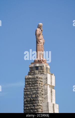 Tarifa Espagne. Statue de Jésus Christus à l'entrée du port de Tarifa, Sagrado Corazon de Jesus, statue de jésus christ, Costa de la Luz, Andalousie, Espagne. Banque D'Images