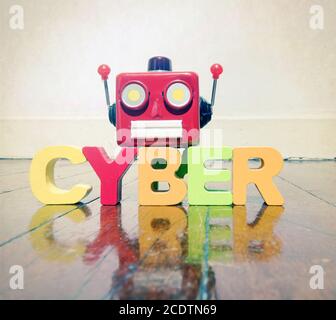 Tête de robot rétro rouge sur le mot CYBER Banque D'Images