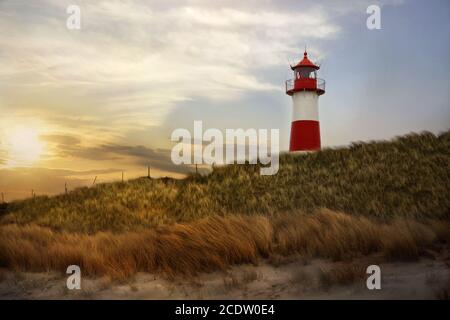 lever du soleil au phare Banque D'Images