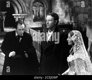 JOHN ABBOTT en tant que Mason ORSON WELLES en tant qu'Edward Rochester et JOAN FONTAINE comme JANE EYRE 1943 directeur ROBERT STEVENSON livre Charlotte Bronte scénario Aldous Huxley John Houseman et Robert Stevenson Musique Bernard Herrmann Fox du 20e siècle Banque D'Images