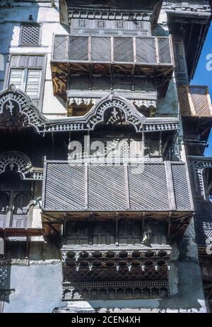 Jidda, Hejaz, Arabie Saoudite. Maisons traditionnelles avec fenêtres de Harem pour les femmes. Photographié le 1973 mai. Banque D'Images