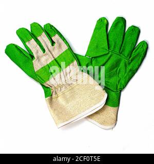 paire de gants de travail avec accents verts sur fond blanc Banque D'Images