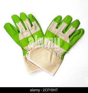 paire de gants de travail avec accents verts sur fond blanc Banque D'Images