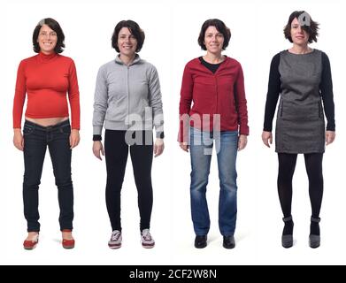 Vue de face d'un groupe de photos de la même femme dans différents costumes et aussi enceinte sur fond blanc. Banque D'Images