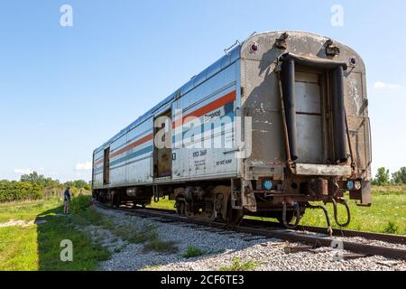 Une ancienne voiture à bagages Amtrak se trouve sur le terrain de la fort Wayne Historical Society à New Haven, Indiana, États-Unis. Banque D'Images