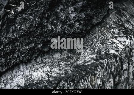 Motifs d'Abstat des piliers de basalte dans la grotte de la mer de Hálsanefshellir sur la plage de Reynisfjara, Vik, Islande Banque D'Images