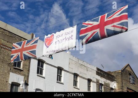 Votre marché local, drapeaux de jack d'Union, panneau, marché de portobello, Londres Banque D'Images