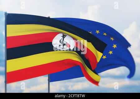 Drapeau de l'Union européenne et drapeau de l'Ouganda. Vue en gros plan, illustration 3D. Banque D'Images