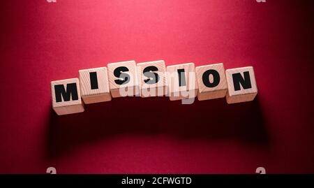 Mot de mission écrit sur des cubes en bois Banque D'Images