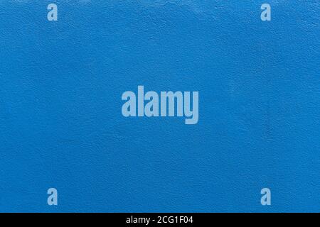 Mur enduit de couleur bleue. Image pour la texture et l'arrière-plan. Banque D'Images
