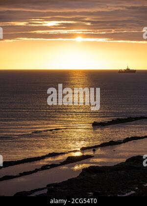 Sunset North Sea, Castle Sands Beach, St Andrews, Fife, Écosse, Royaume-Uni, GB. Banque D'Images