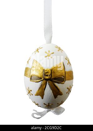 Artisanal doré et blanc peint à la main fait main décoration traditionnelle de l'arbre de Noël, découpée Banque D'Images