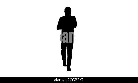 Silhouette surpris jeune homme est mise en attente et la lecture du message. Banque D'Images